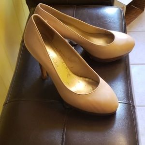 Bone colored shoes. Gently warn,  but in good cond